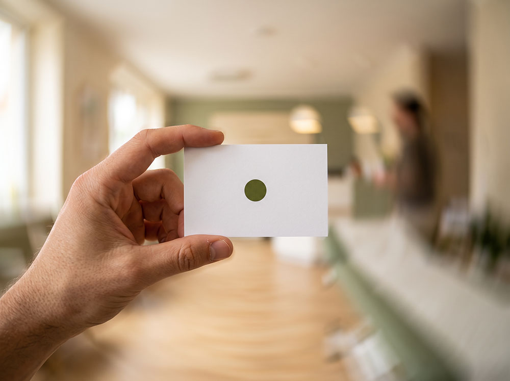 Fixation target held steady while the surrounding room blurs during vestibular gaze training
